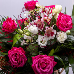 beautiful florist bouquet of roses and freesias