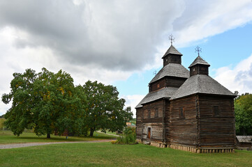 Fototapeta na wymiar Old wooden church in the village 