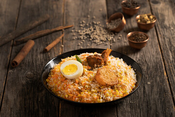 Kachchi Biriyani, chicken biriyani, prawn biriyani, Dhaka style biriyani, plain polau cooked by aromatic rice or chinigura rice isolated on white background.