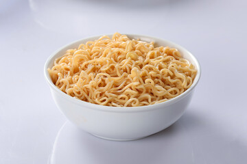 Bowl of noodles on white background