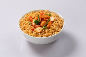 Bowl of noodles on white background