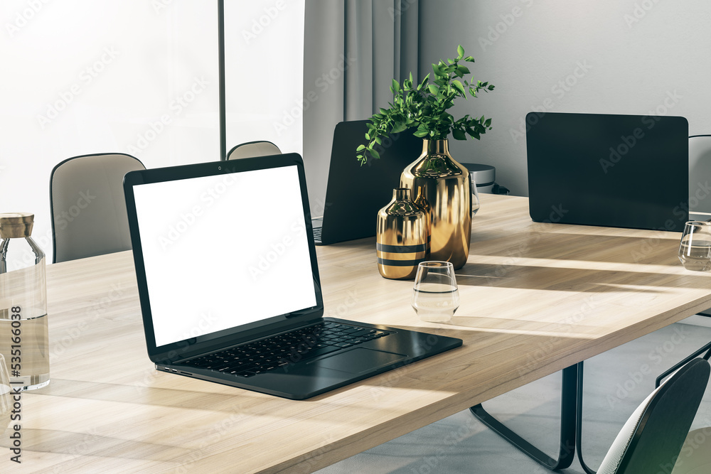 Poster perspective view on blank white monitor screen with place for your logo or text on wooden meeting ta