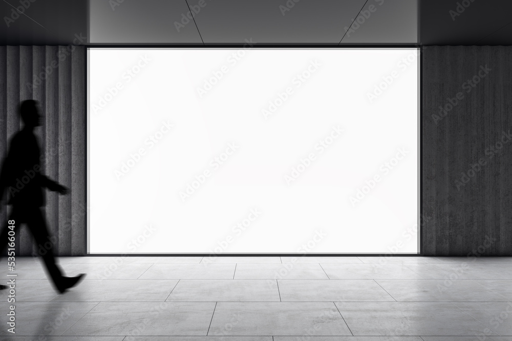 Poster dark man silhouette walking by big blank white screen with space for your logo or text in abstract e