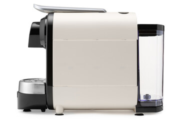 Beige electric coffee machine, for making capsule coffee, on a white background, side view, isolate