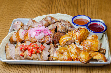 assorted meat with sauce and onion