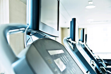 Detail shot of treadmills in modern gym