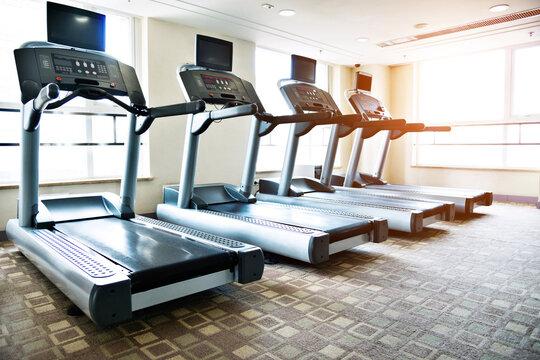 Group of treadmills in modern gym