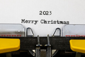 Merry Christmas 2023 written on an old typewriter	
