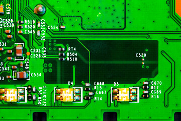 Close up of components and microchips on PC circuit board.