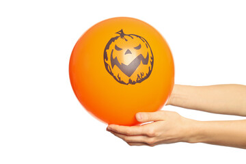 Female hands hold halloween balloon, isolated on white background