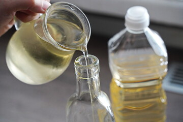Sunflower oil in a plastic bottle in the kitchen