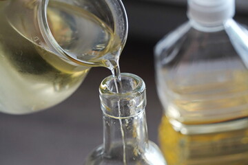 Fototapeta na wymiar Sunflower oil in a plastic bottle in the kitchen