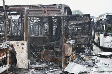 Burnt buses after a missile attack on the city of Dnipro, Ukraine.