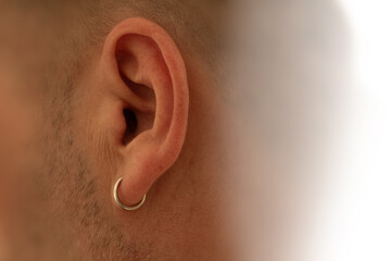 Earring in the ear, Close-up, Piercing in the ear Men