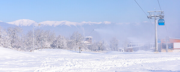 Ski resort Bansko, Bulgaria, cable car and slope