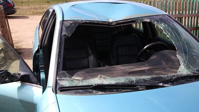 A car after a collision with pedestrians and an accident. Damage to the car body and roof. Emergency state, close-up