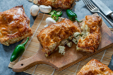 Mini chicken and mushroom puff pastry pies © beataaldridge
