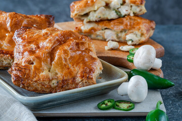 Mini chicken and mushroom puff pastry pies