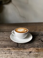 cup of coffee on wooden table