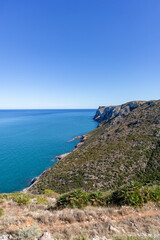 Fototapeta premium Cliffs in the Mediterranean Sea in the south of Spain. White coast Spain. Valencian Community