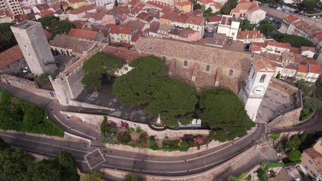 Ch&acirc;teau de la Castre, Cannes, France. Aerial View of Castle and Church Clock Tower Landmarks, Drone Shot