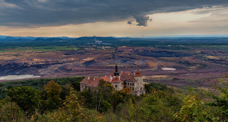 State Chateau Jezeří near Most with brown coal mines in the background - Czech Republic, Europe