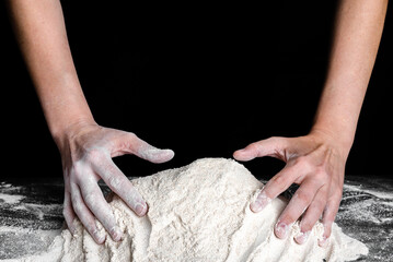 Baker with hands in flour. Baking concept.