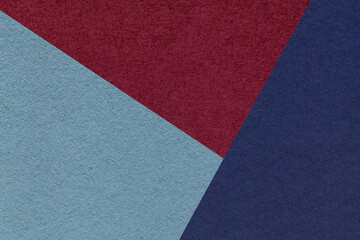 Fototapeta premium Texture of craft navy blue, wine and denim shade color paper background, macro. Vintage abstract cardboard