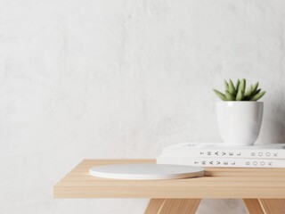 3d ceramic display podium with succulent in vase and white books on the wooden table. 3d rendering of realistic presentation for product advertising. 3d illustration.