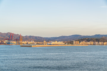 Fototapeta na wymiar Panoramic view of Málaga city and its harbour see from sea