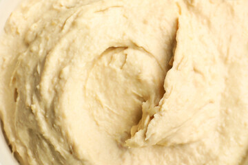 Classic tasty hummus as background, top view