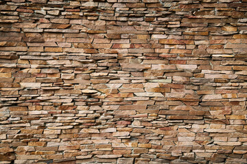stock photo of rough stone wall with decorative structure