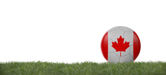 Soccer ball with canada flag on grass, copy space with white background.
