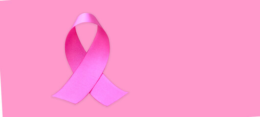 Isolated pink ribbon, symbol of female breast cancer awareness campaign in Ocotober, with clipping paths.