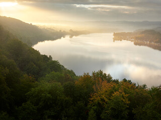 Essen, Germany - View of Lake Baldeneysee and Ruhr river at foggy sunrise. A beautiful autumn landscape. Gold autumn.