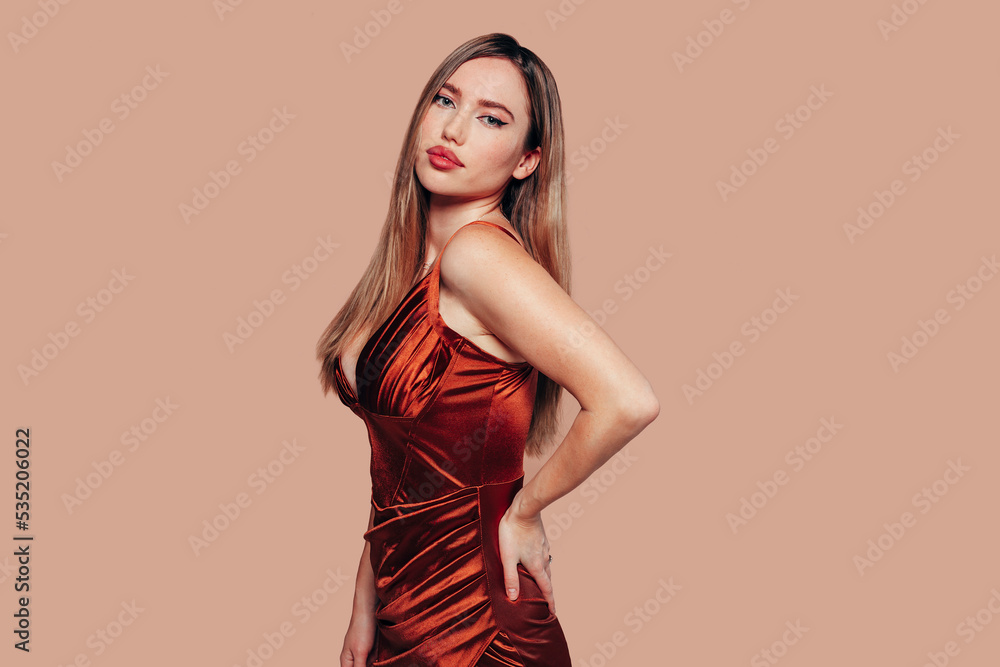 Wall mural portrait of young stunning model with bright impressive red lips. studio photo shoot of pretty woman