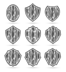 Shield icon set. Grunge style badge shape security symbol set silhouette illustration vector