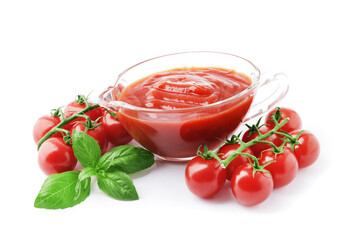 composition of Tomato sauce in a gravy boat with fresh tomatoes and basil isolated on white background. 