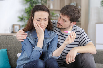 upset couple not wanting to have child