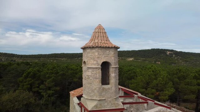 Video of the rocky cliffs of the abandoned village La Mussara, Tarragona, with views of mountains, forests and sky with clouds. "Spain emptied". Depopulation.
