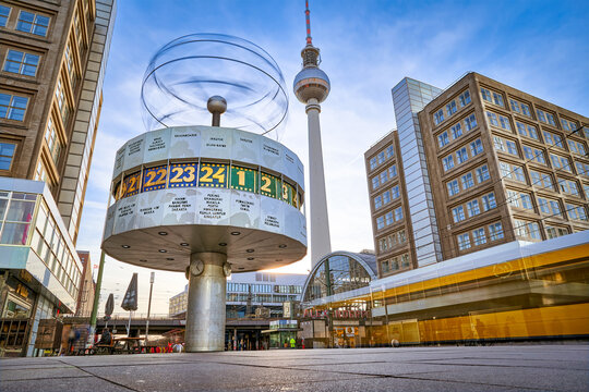Berlin, Germany - 21.03.2022: panoramic view on the Urania World Clock in Berlin and TV Tower on the Alexander Square,  a tourist attraction and meeting place