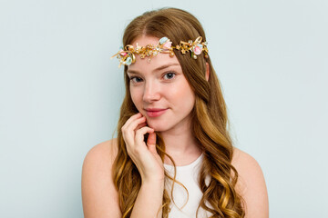 Young elf woman isolated on blue background