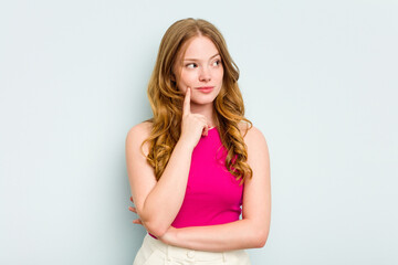 Portrait of pretty young caucasian woman isolated on blue background