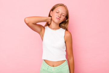 Obraz na płótnie Canvas Caucasian teen girl isolated on pink background massaging elbow, suffering after a bad movement.