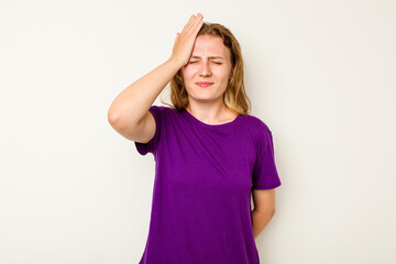 Fototapeta premium Young caucasian woman isolated on white background forgetting something, slapping forehead with palm and closing eyes.