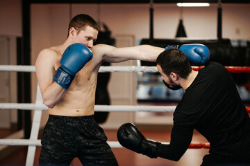 Boxers train in the ring and in the gym