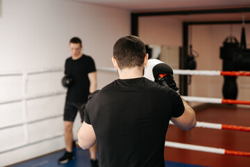 Boxers train in the ring and in the gym