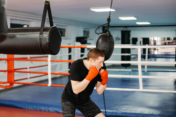 Boxers train in the ring and in the gym