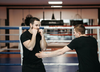 Boxers train in the ring and in the gym