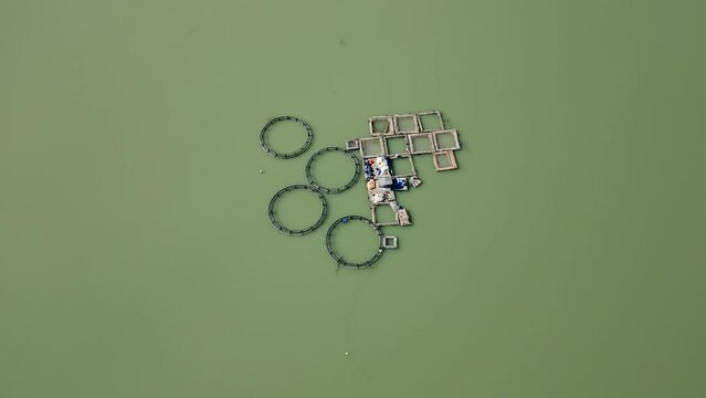 Aerial view of fish farm in Antalya Korkuteli dam lake on a sunny day